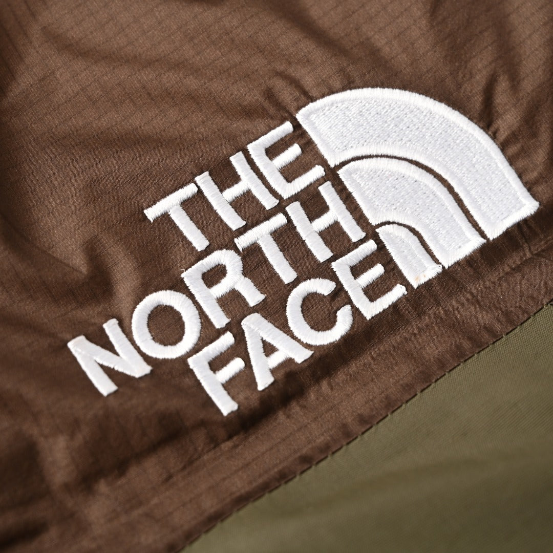 The North Face Green Puffer Jacket for Outdoor-Inspired Wardrobes